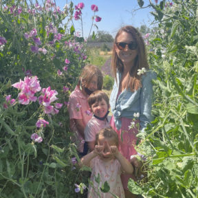 Mother with her children at the flower farm