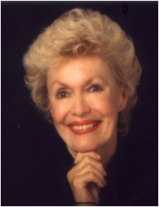 A portrait photo of Jean Runyon smiling
