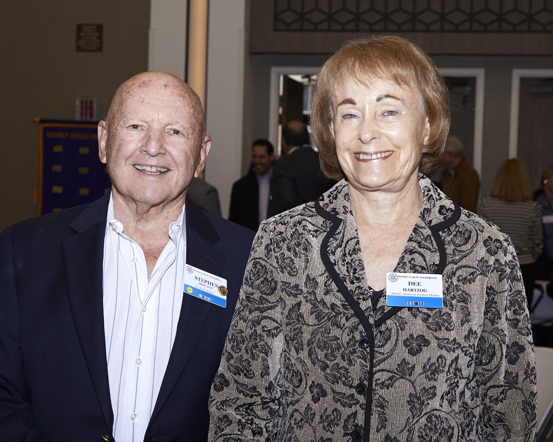 Man and woman smiling for camera
