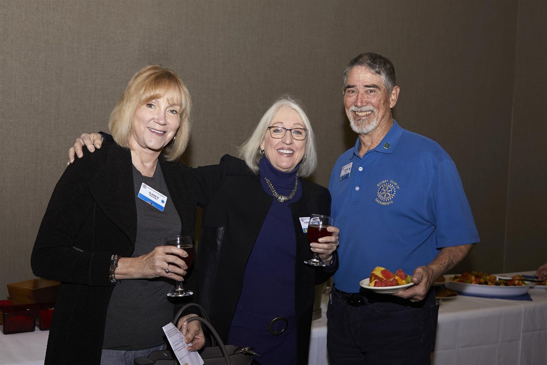 3 people smiling