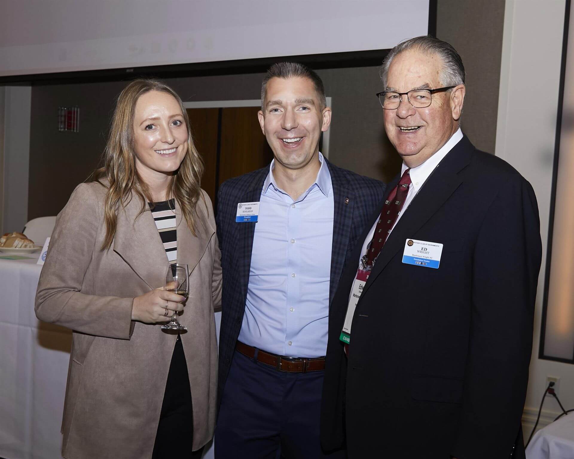 President Todd posing with woman and man
