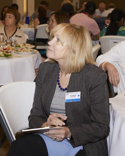 woman sitting at a table