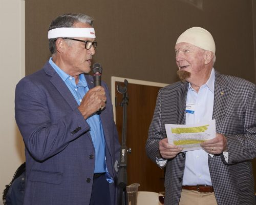 person speaking into microphone