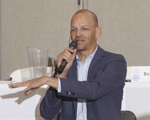 man speaking into microphone