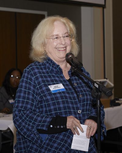 person speaking into microphone