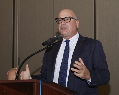 person speaking into microphone