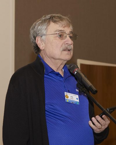 person speaking into microphone