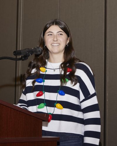 person speaking into microphone