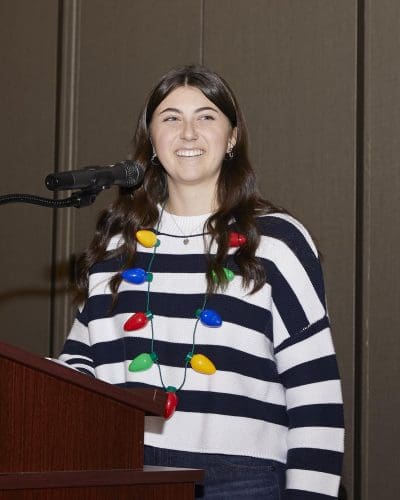 person speaking into microphone