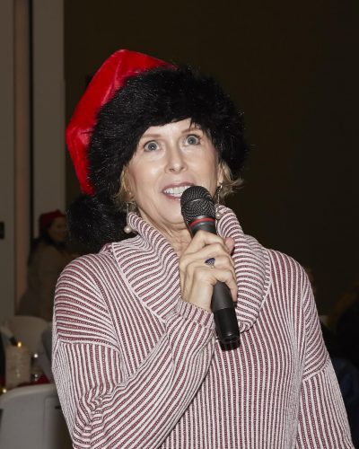 person speaking into microphone