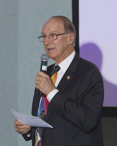 person speaking into microphone