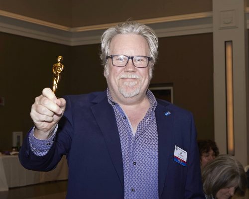 person holding trophy