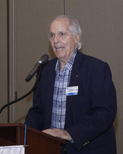 person speaking into microphone