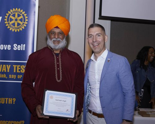 two person photo with certificate