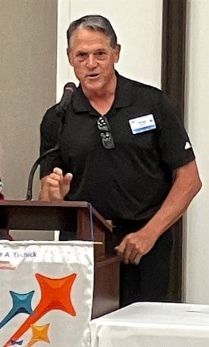 person speaking into microphone
