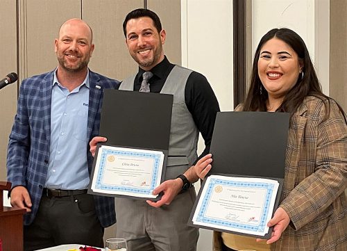 group photo of people holding certificates
