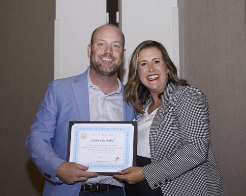 bobby reed holding a certificate for chelsea