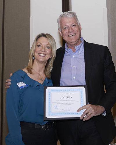 A man and woman of Rotary Sacramento standing together for a photograph