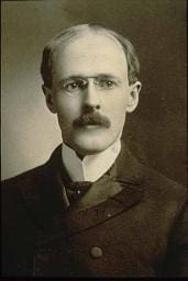 an old black and white photo of Paul Harris