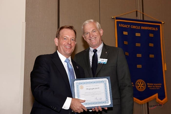 an image of U.S. Attorney McGregor Scott standing next to John Lemmon