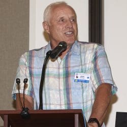 person speaking into microphone