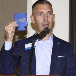 person speaking into microphone