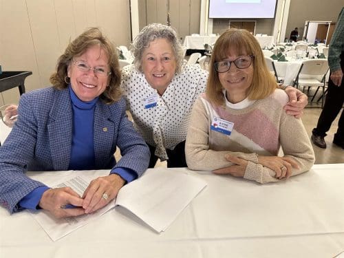 three women at a table