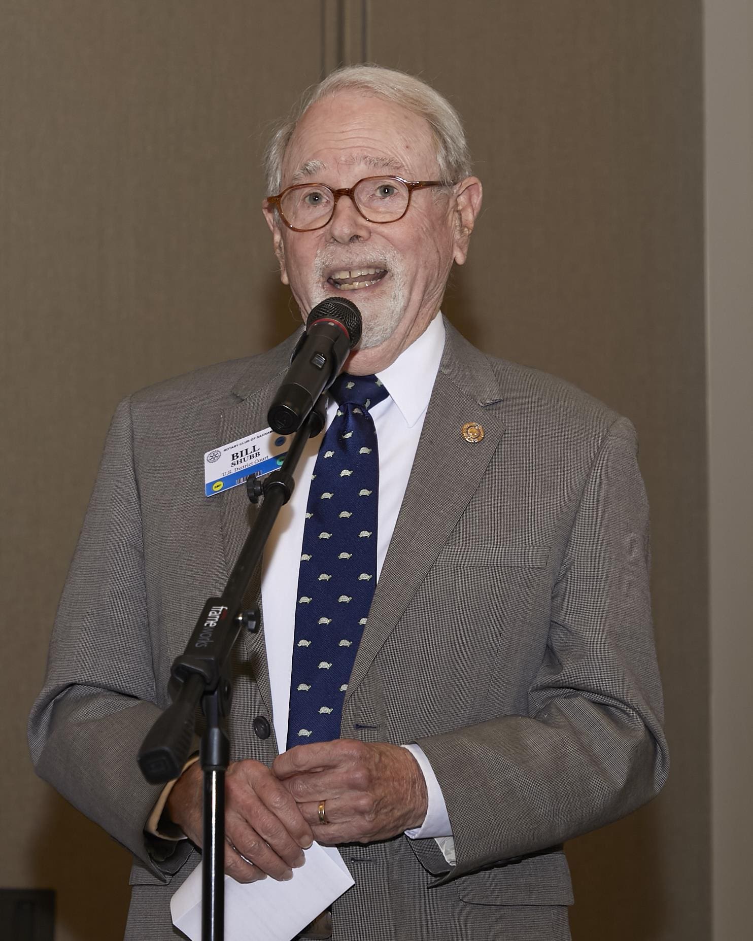 Man speaking into a microphone