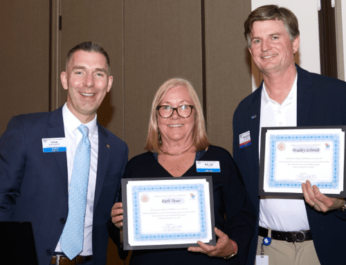 Presenters Ruth Tesar and Brad Schmidt with President Todd