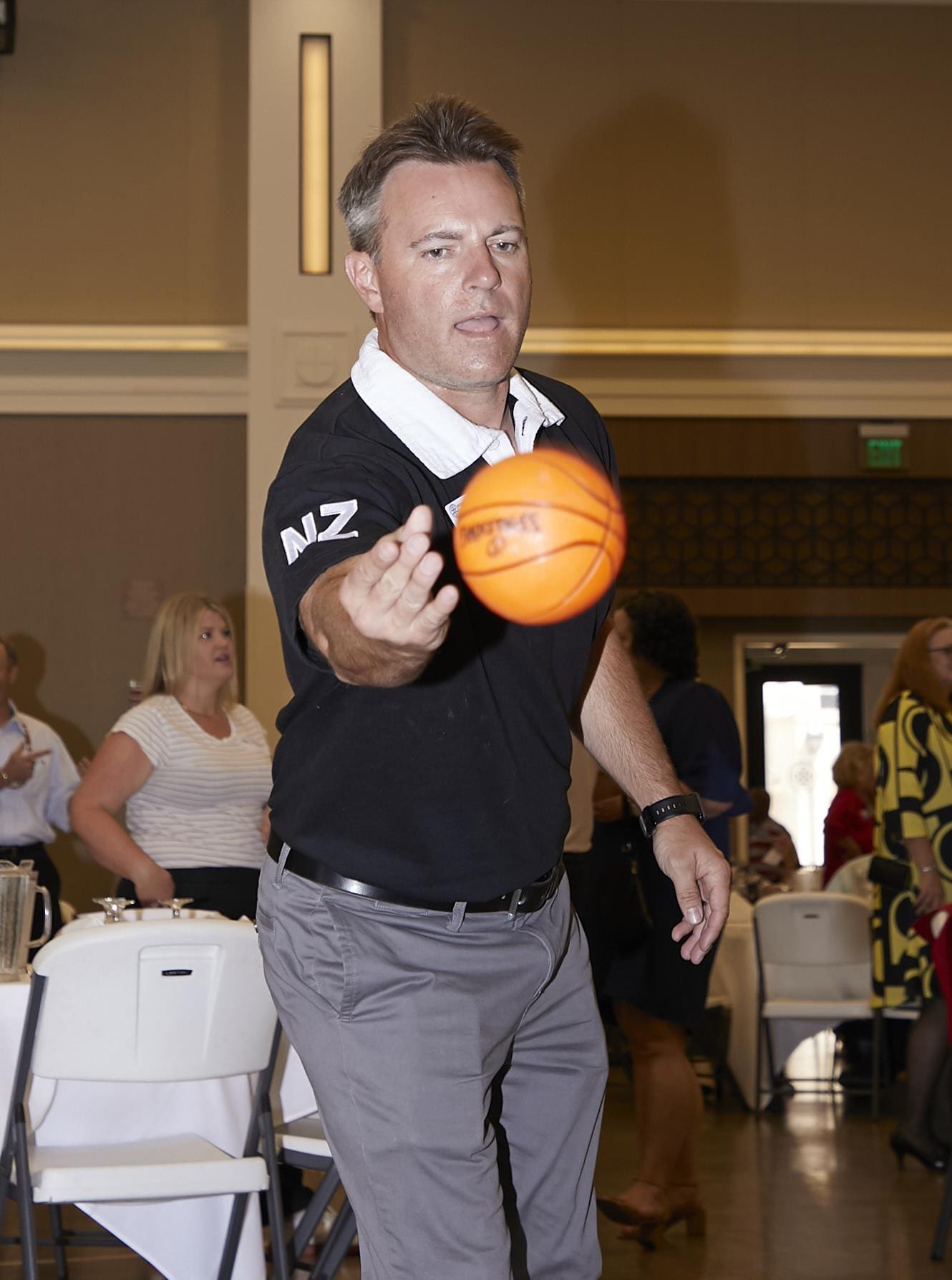 person playing with a basketball