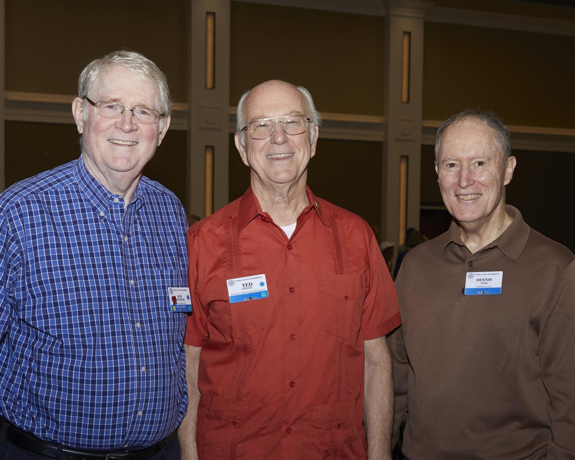 3 people smiling