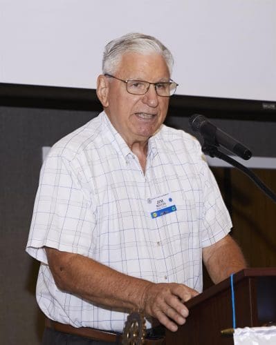 man speaking into microphone