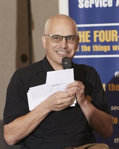 man speaking into microphone