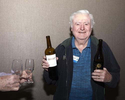 person holding a bottle 