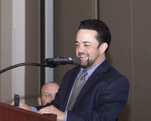 person speaking into microphone
