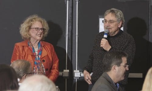 person speaking into microphone