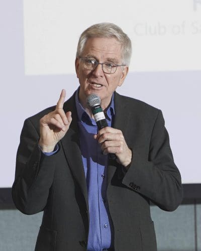 person speaking into microphone